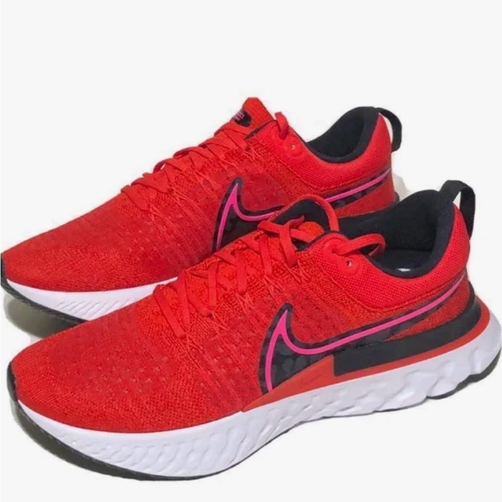 Women’s Nike React Infinity Flyknit 2 running shoe in a size 9.5 colr Red